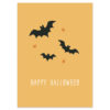 Oranje postkaart met zwarte vleermuizen van het merk Pinkstore