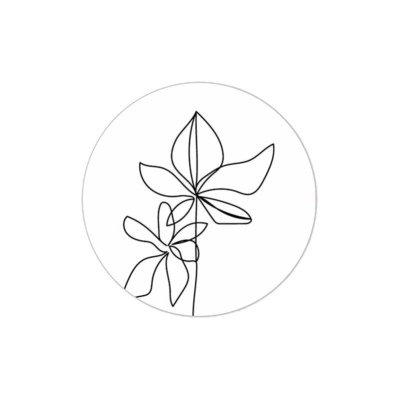 Ronde witte stickers met illustratie van zwarte bloemen